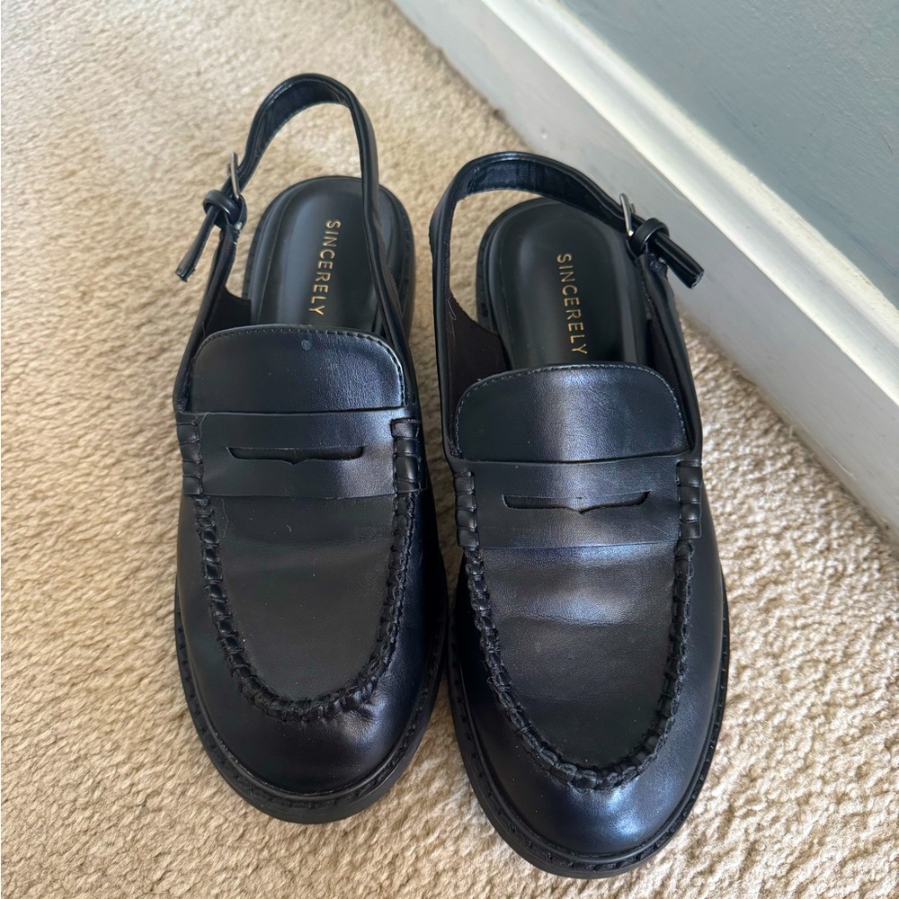 Black sling back mules